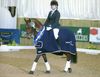 Lucy Pincus riding Sheepcote Sandmartin in the prize giving